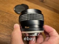 Late Model Mint Minolta MC W Rokkor 24mm F/2.8 Wide Angle Lens From Japan